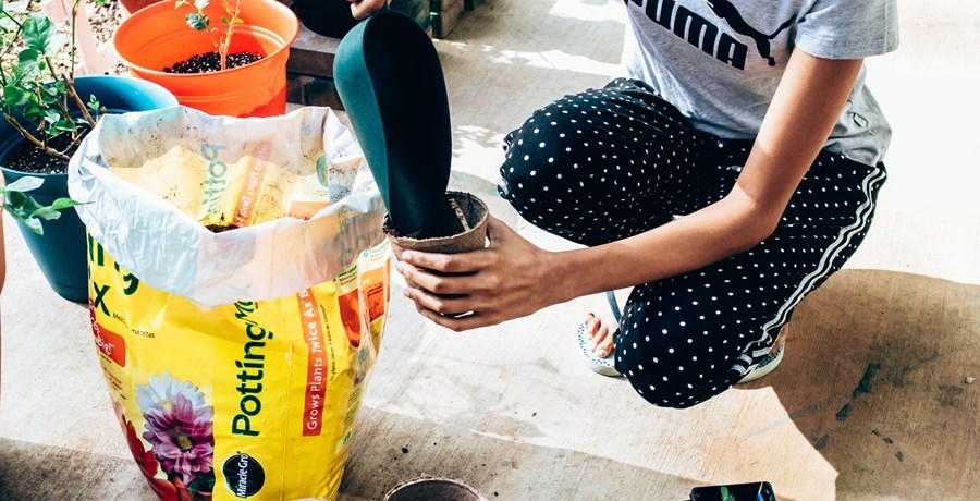 Filling up a pot with compost