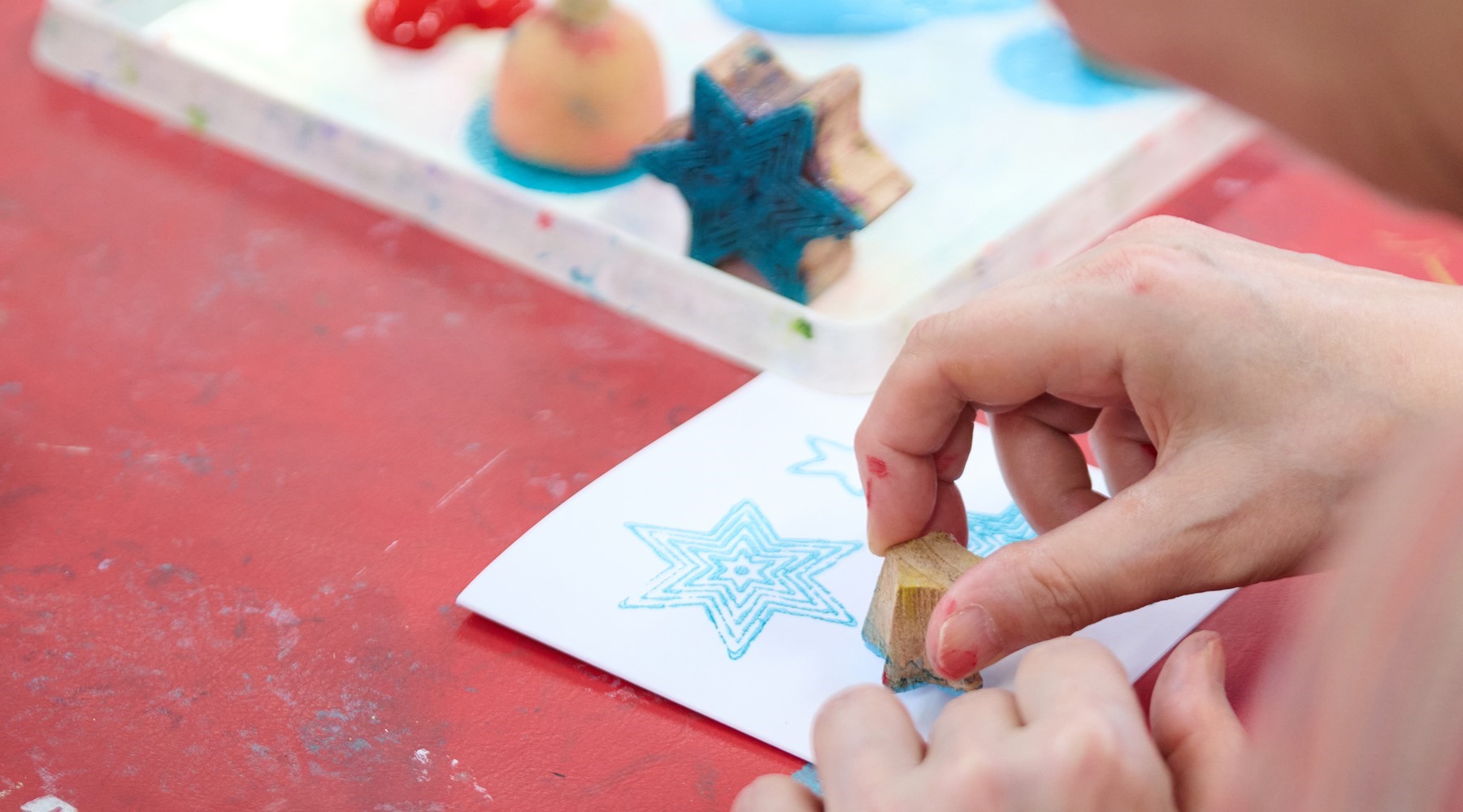 Block printing using star shaped stamps