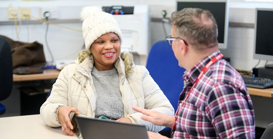 Learner being interviewed for English course