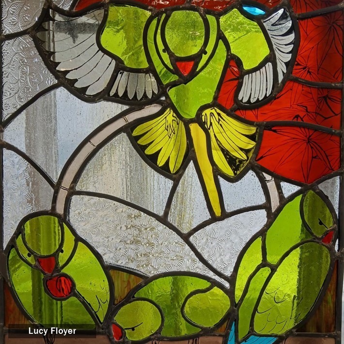 Stained glass parrots