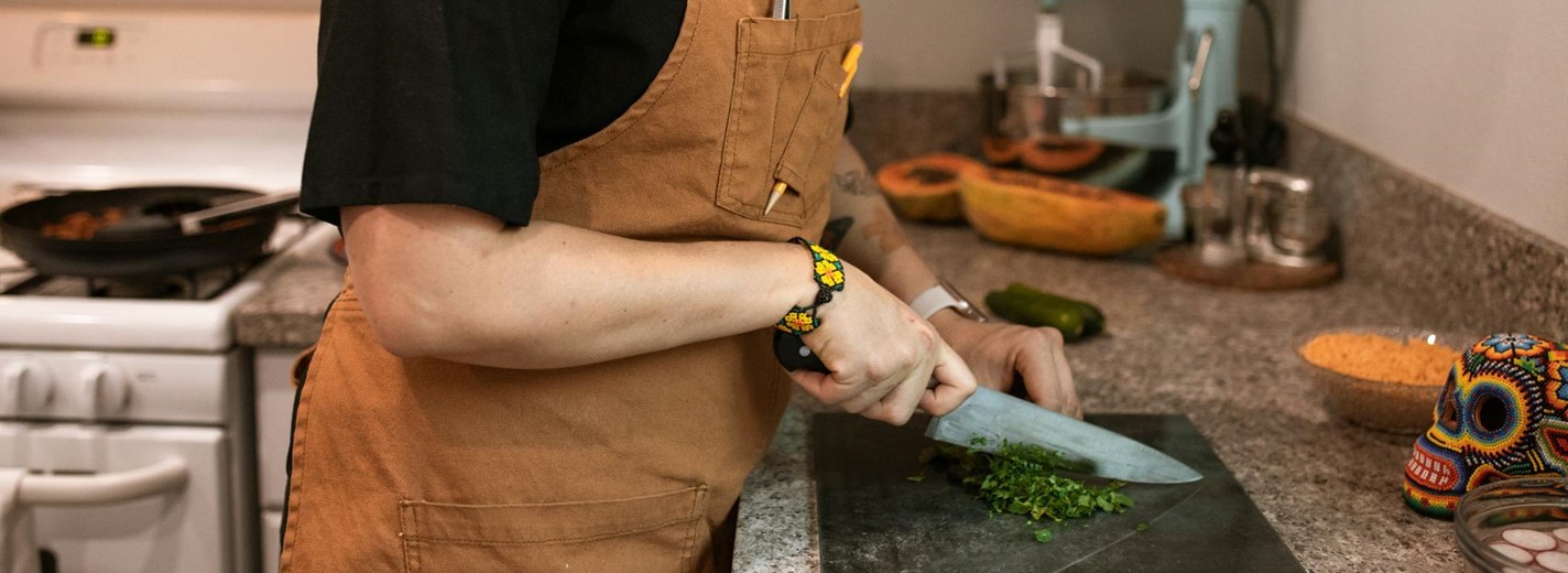 two men preparing food