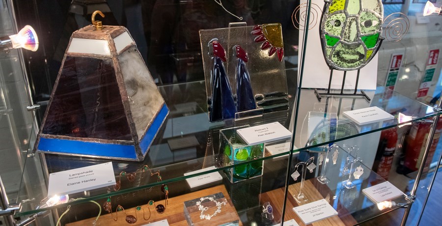 Display cabinet of stained glass and jewellery work