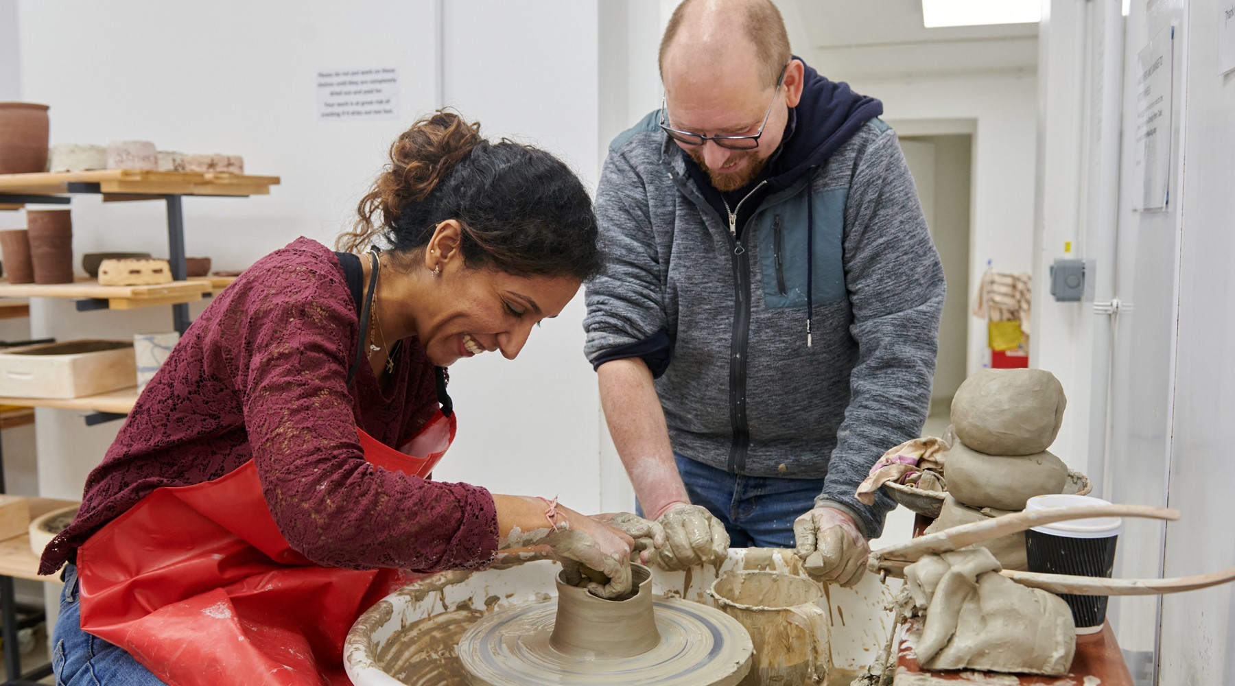 Woman at a pottery wheel